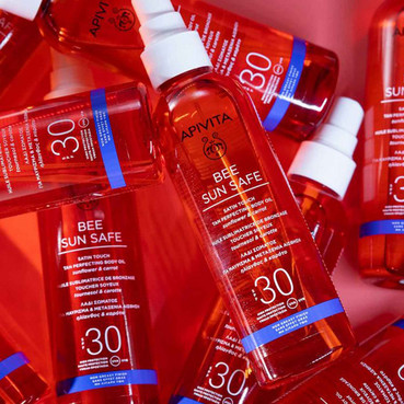сонцезахисна олія для засмаги тіла з spf30 apivita bee sun safe satin touch the perfecting body oil spf30 фото