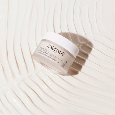 дневной крем для сияния кожи лица caudalie vinoperfect instant brightening mousturizer cream фото