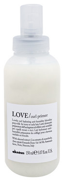 Зволожуюче молочко для хвилястого і кучерявого волосся Davines Love Curl Primer фото