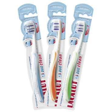 Зубна щітка з пластиною для чищення язика 